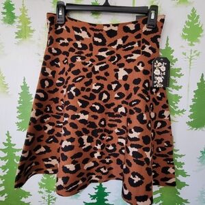Classic Concepts Leopard Print Trumpet Skirt.